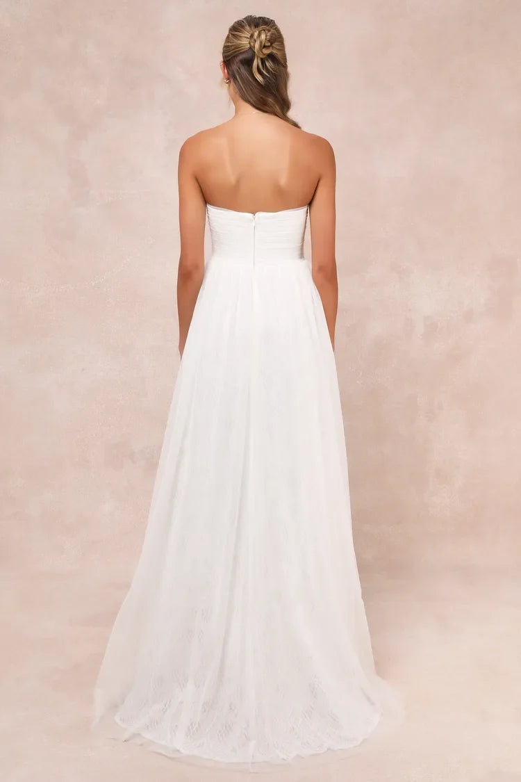XAYWEAR strapless white bridal gown with flowing skirt and fitted bodice back view