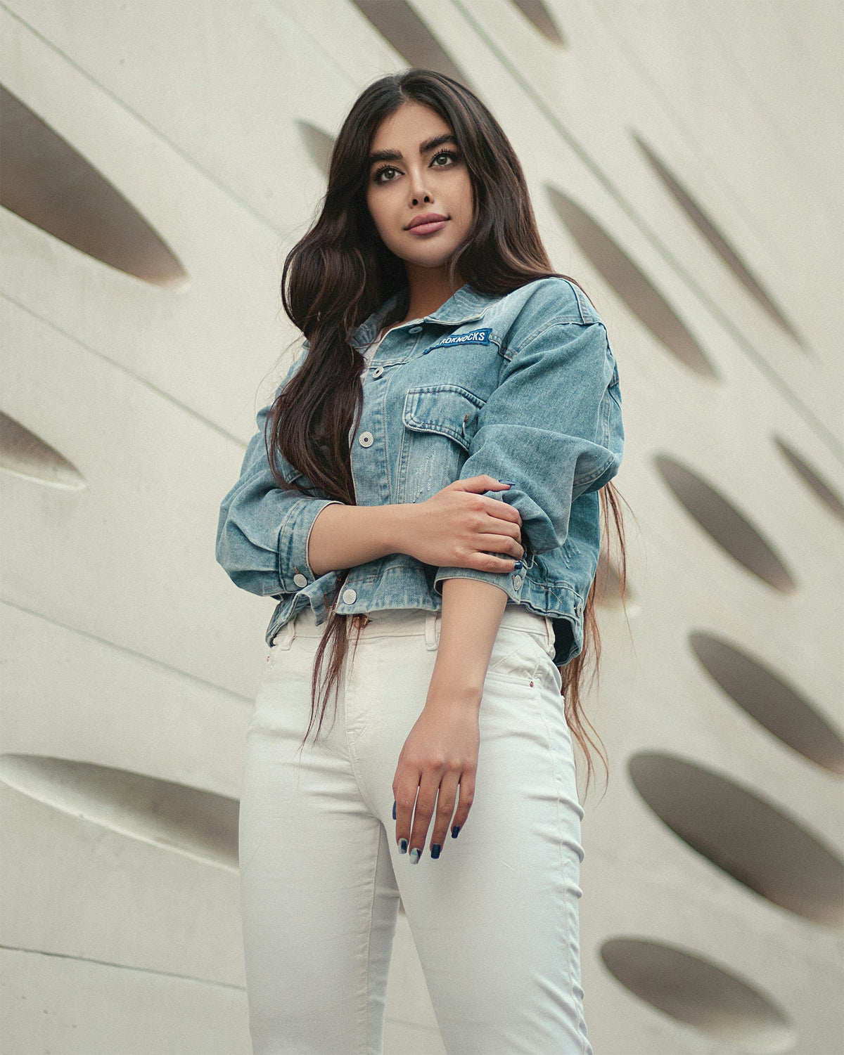 XAYWEAR denim jacket for women styled with white pants, featuring a cropped fit and button details