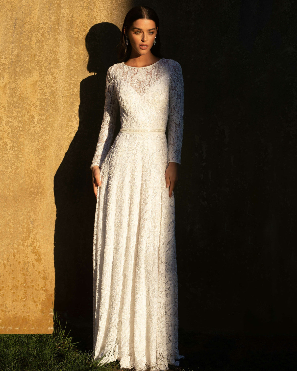 XAYWEAR white bridal gown with long lace sleeves and elegant fitted waist design