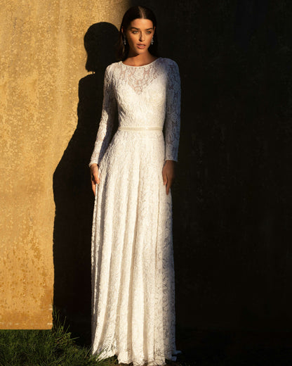 XAYWEAR white bridal gown with long lace sleeves and elegant fitted waist design