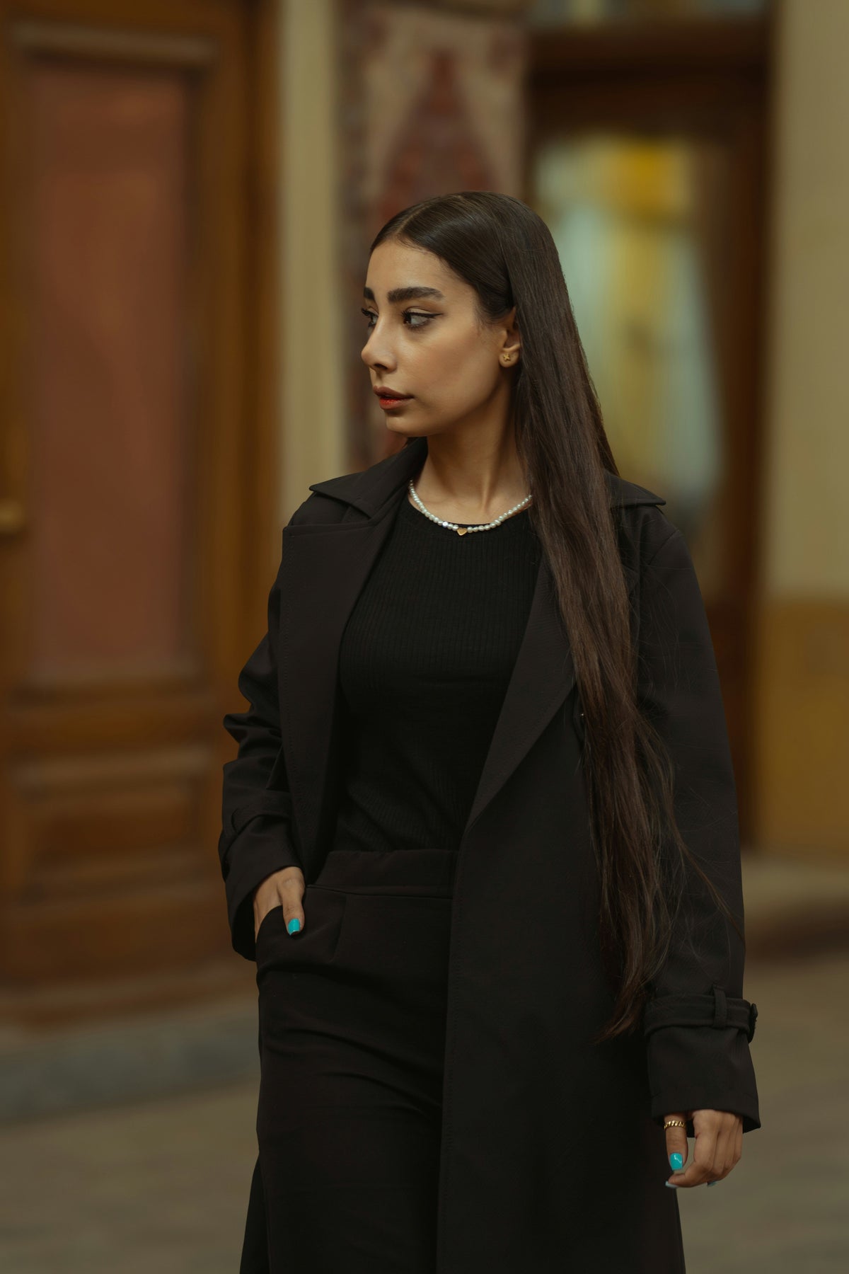 Elegant XAYWEAR luxury black coat for women styled with a chic outfit, perfect for any occasion