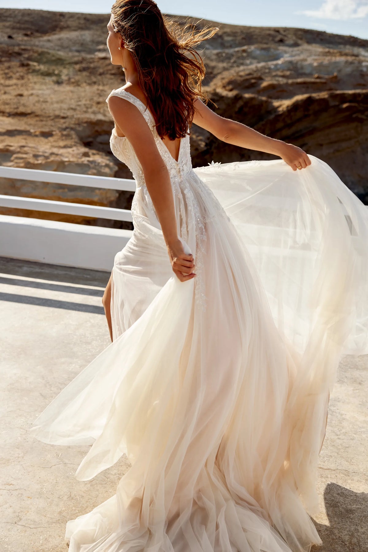 XAYWEAR wedding dress gown with flowing tulle skirt and lace back detail outdoors