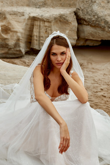 XAYWEAR elegant wedding dress with lace bodice and tulle skirt worn by bride outdoors